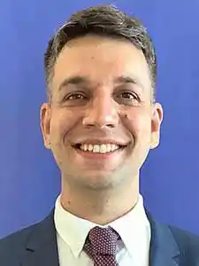 Headshot of André Alves Tooley