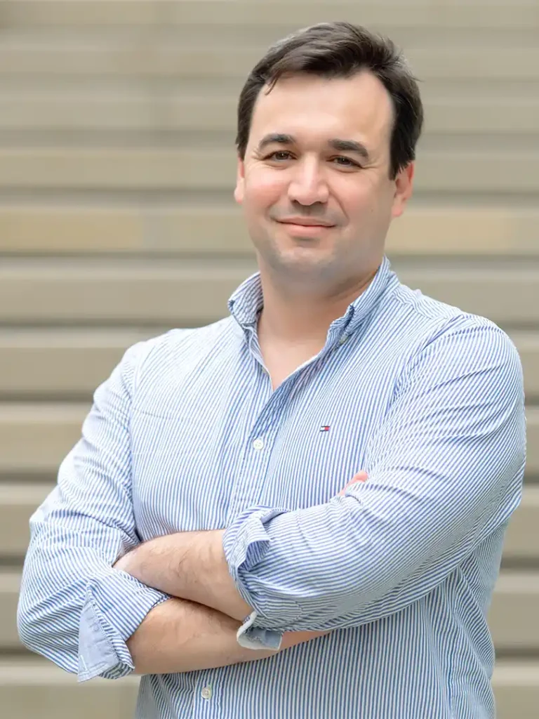 Headshot of Marcos de Castro Osório